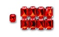 Ruby loose gemstones pile on white background Royalty Free Stock Photo