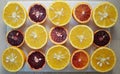 Ruby red blood oranges and navel oranges cut in half Royalty Free Stock Photo