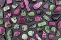 Ruby zoisite rare stones texture on black stone background Royalty Free Stock Photo