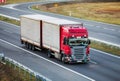 Ruck with container on highway, cargo transportation concept