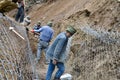 Labor working for Kedarnath reconstruction after disaster.
