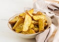 Ruddy Baked potato wedges with garlic Royalty Free Stock Photo