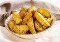 Ruddy Baked potato wedges with garlic Royalty Free Stock Photo