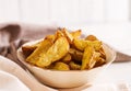 Ruddy Baked potato wedges with garlic Royalty Free Stock Photo