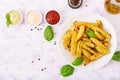 Ruddy Baked potato wedges with herbs Royalty Free Stock Photo