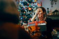 Ungrateful Woman Refusing a Christmas Gift from a Friend