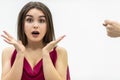 Rude man behaviour. Close up shot of girl completely shocked by her boyfriend attitude as he shows a zilch saying that Royalty Free Stock Photo