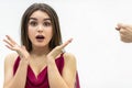 Rude man behaviour. Close up shot of girl completely shocked by her boyfriend attitude as he shows a zilch saying that Royalty Free Stock Photo