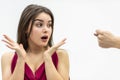 Rude man behaviour. Close up shot of girl completely shocked by her boyfriend attitude as he shows a zilch saying that Royalty Free Stock Photo