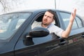 Rude man driving his car and arguing Royalty Free Stock Photo