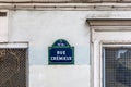 Rue Cremieux street sign. Pedestrian and paved street, lined with small pavilions with colorful facades in Paris