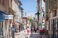 Rue de la Liberte, a pedestrian street with traditional French architecture buildings in a commercial downtown zone