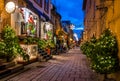 Rue du Petit-Champlain at Lower Old Town Basse-Ville decorated for Christmas at night - Quebec City, Quebec, Canada Royalty Free Stock Photo