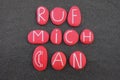 Ruf mich an, call me, german text composed with red painted stone letters over black sand Royalty Free Stock Photo