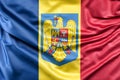 Ruffled Flag of Romania with coat of arms. 3D Rendering Royalty Free Stock Photo