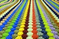 Rug background of knitted strips of different colors Royalty Free Stock Photo