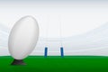 Rugby ball on stadium filed and rugby goal posts Royalty Free Stock Photo