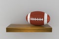 Rugby ball on wooden shelf