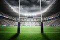 Rugby goal post at illuminated stadium Royalty Free Stock Photo