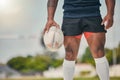 Rugby, man and ball, zoom on legs of strong, muscular male ready at winning game on field. Fitness, sports and Royalty Free Stock Photo