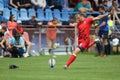 Rugby player kicking the ball