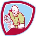 Rugby Player Running Charging Shield Cartoon