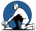 Rugby player setting up kick