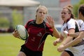 Rugby Woman Carries Ball