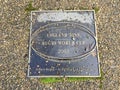 Rugby world cup plaque on pavement in rugby town centre