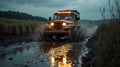 rugged car splashes through a muddy trail at sunset Royalty Free Stock Photo