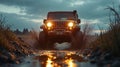 rugged car splashes through a muddy trail at sunset Royalty Free Stock Photo