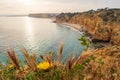 The rugged coastline at dawn, overlooking beach near Lagos in the Algarve, Portugal