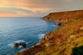 Rugged Cornish coastline at Porth Nanven on sunny evening, Cornwall, England Royalty Free Stock Photo