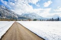 a dirt road that goes up to the top of a mountain Royalty Free Stock Photo