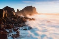 Rugged Icelandic coastline with big waves hitting the black rocks in south west Iceland. Typical Icelandic landscape sunrise Royalty Free Stock Photo