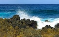 Rugged Lava Rocks and High Surf on Tropical Island Royalty Free Stock Photo