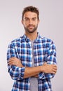 Rugged and manly. Studio portrait of a handsome man against a gray background.