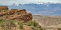 Rugged Moab terrain overlooking La Sal Mountains Royalty Free Stock Photo