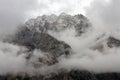 Rugged Mountain Peak Shrouded In Storm Clouds Royalty Free Stock Photo