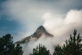 Rugged Nevado De Colima mount peak surrounded by smoky clouds in Mexico Royalty Free Stock Photo