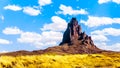 The rugged peaks of El Capitan and Agathla Peak towering over the desert landscape south of Monument Valley Royalty Free Stock Photo