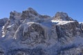 Rugged rock faces of the Sellastock mountain massif in winter, Dolomite, South Tyrol, Italy Royalty Free Stock Photo