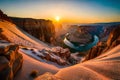 A rugged and rocky canyon with a winding river carving its way through the deep gorge Royalty Free Stock Photo