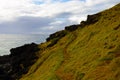 Rugged seaside green hill with path at Port Macquarie Australia