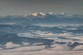 Snowy Little Fatra peaks and forest in mist at sunrise Slovakia Royalty Free Stock Photo