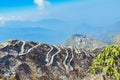 Rugged terrain of lower Himalayas in East Sikkim, Zuluk or Dzuluk, from Thambi View Point. Winding road of 32 hairpin turns. Royalty Free Stock Photo