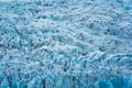 Rugged textured natural blue iceberg in Fjallsarlon iceberg lagoon