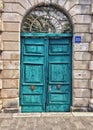 Rugged turquoise doors Royalty Free Stock Photo