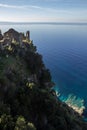 A ruin above the mediterranean clear sea, in Nonza, Corsica, France. Royalty Free Stock Photo