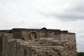 Ruin of ancient fortress wall with orthodox ikon of Nicolas the Wonder worker